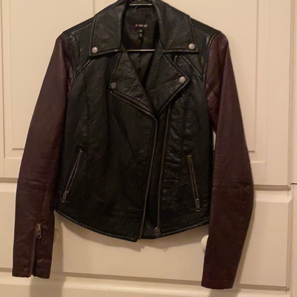 Burgundy/black leather jacket, silk lined.